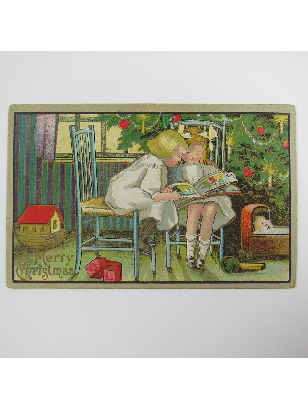 Christmas Postcard Children Boy Girl Sit Read Tree Toys Gold Embossed Antique